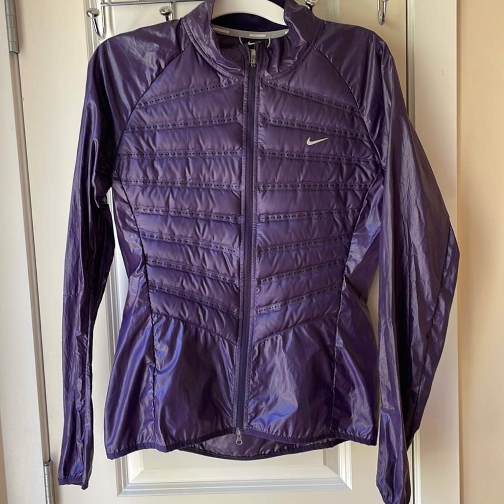 Nike running jacket purple medium down in front and back panel. Water repellent